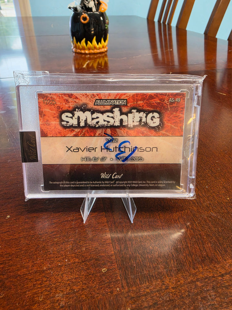 2023 Wild Card Alumination #AS9 Xavier Hutchinson Smashing Orange Ink Auto/25Texans