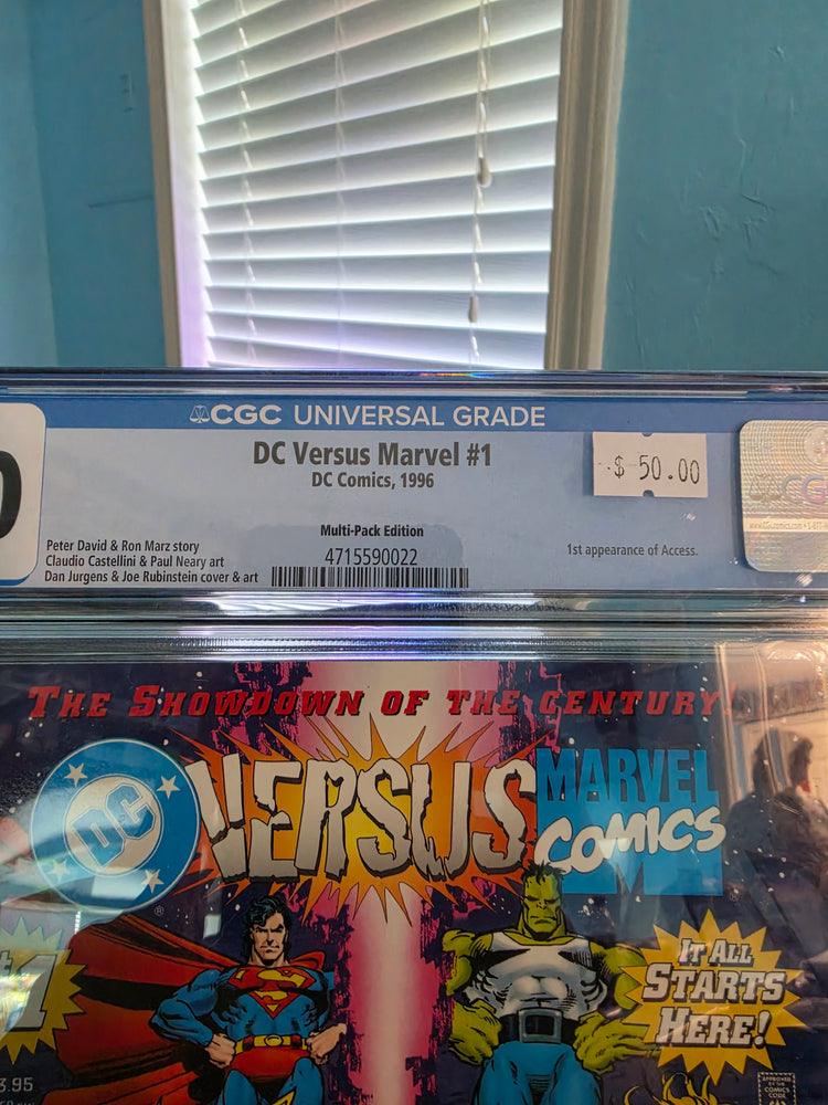 DC Versus Marvel #1 (1996) 7.0 Grade